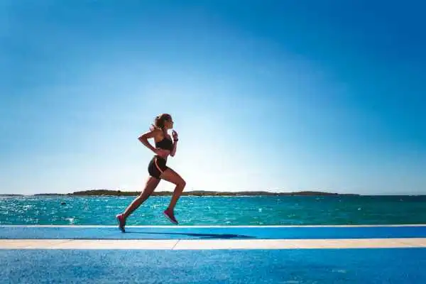 Woman running showing strong leg muscle Gainsborough